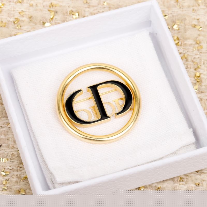 ch**an D*or brooches